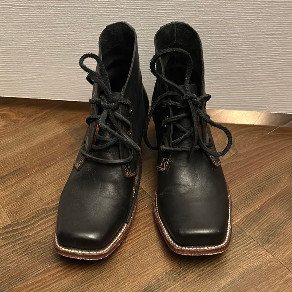 I believe high simon black John Fluevog